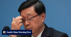 Lee vows to stay on, says housing minister’s resignation his ‘political decision’