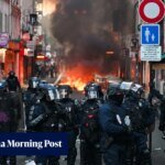 Paris police in new battles with protesters and looters