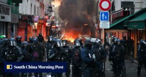Paris police in new battles with protesters and looters