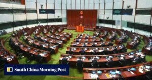 Hong Kong lawmakers back 5-year plan as firms urged to align with blueprint